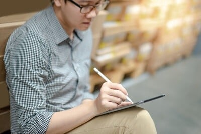 Professional assistant doing a physical inventory count